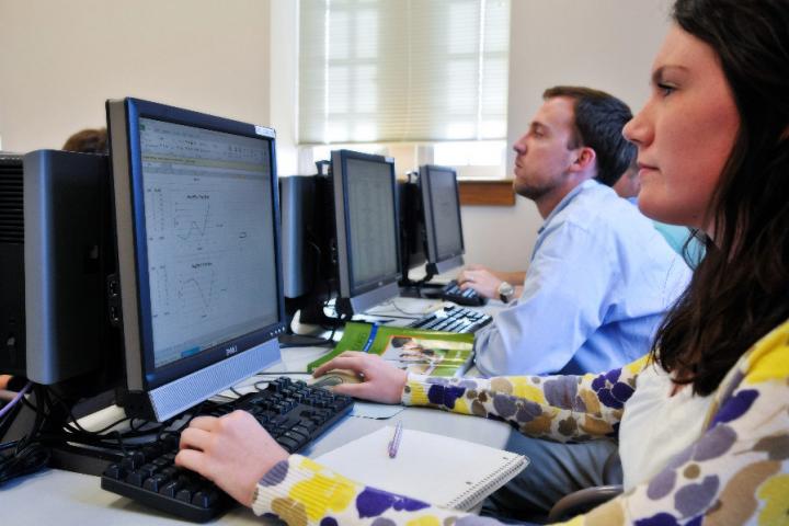 Man and woman at computers