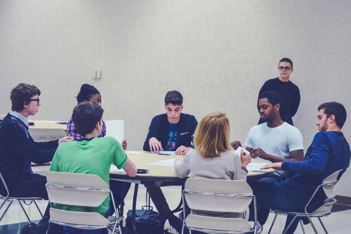 CIE Index Page 1 Group of students talking at a table