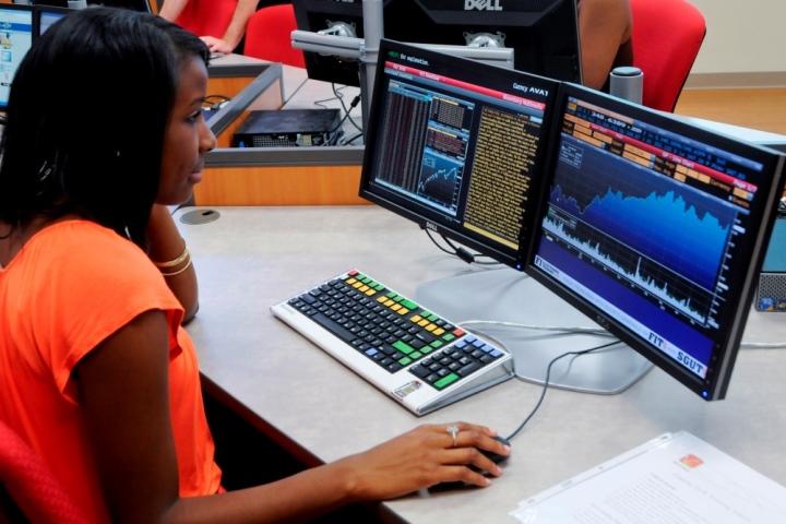 Female working on desktop computer