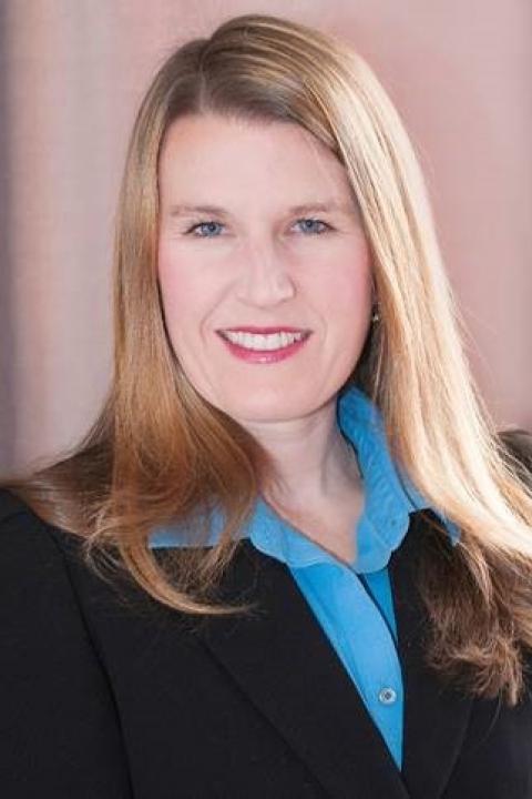Jennifer Vancil, Graduate Career Coach Profile photo of Jennifer Vancil in blue shirt and black jacket