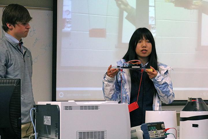 Girl teaching class