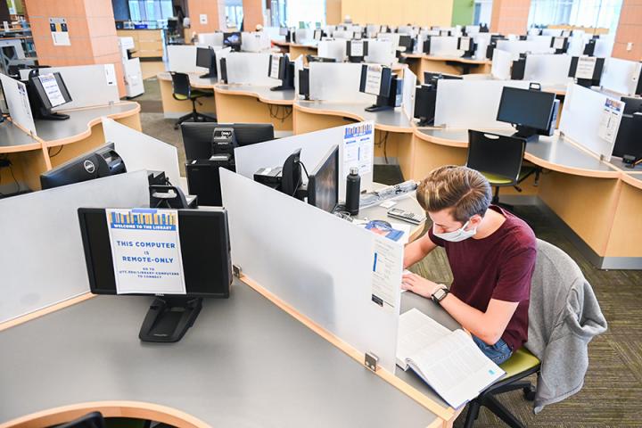 student working in information commons