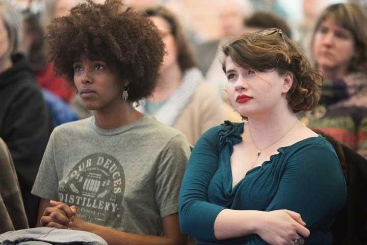 Two students sit in class 