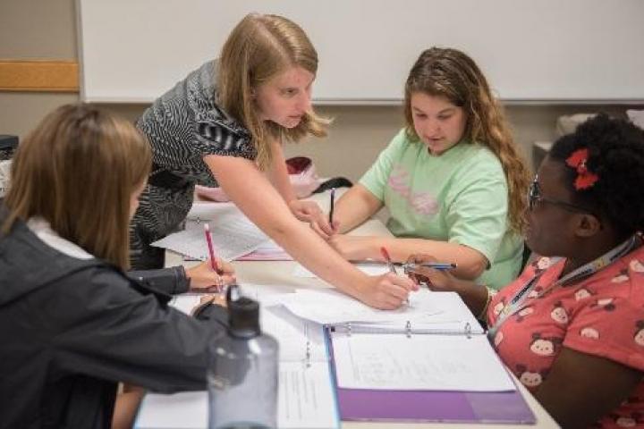 professor helping students