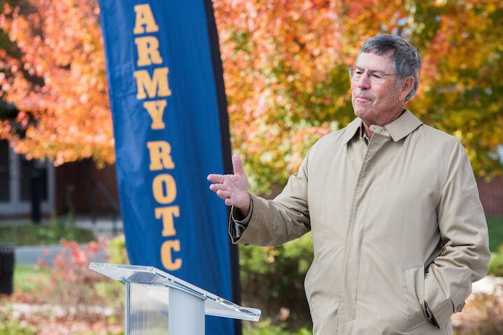 man standing at podium