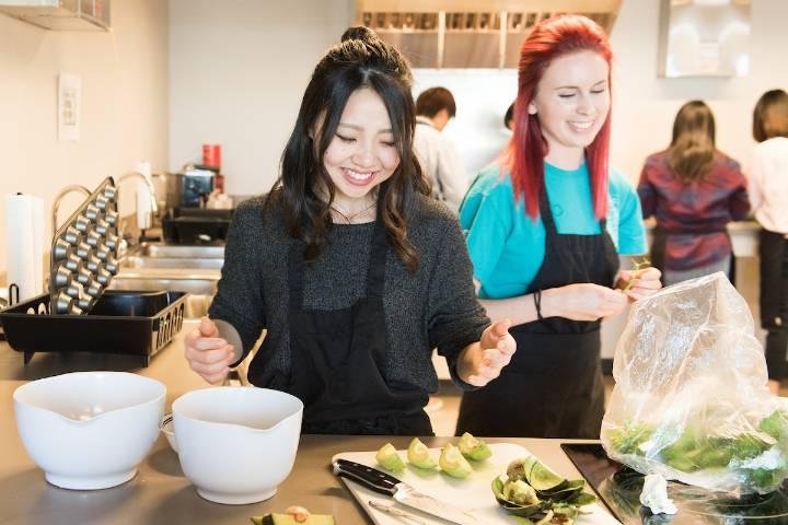 Two students cook