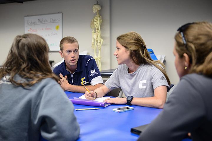 HHP Students have a group discussion