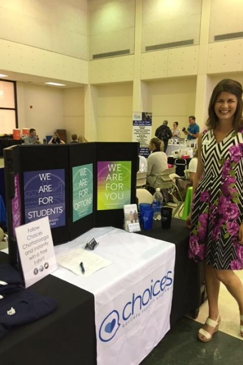 Woman at "Choices" table