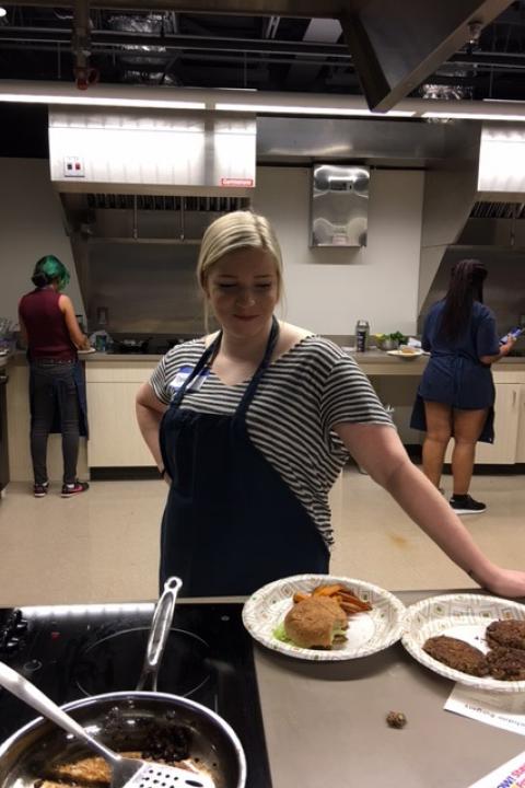 Woman in apron cooking