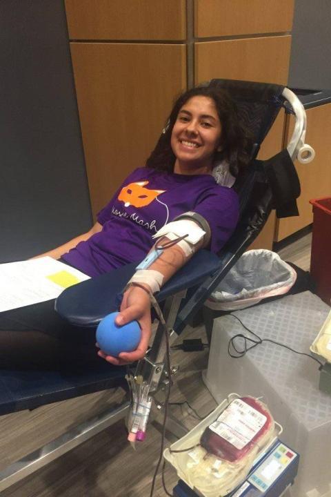 Woman giving blood