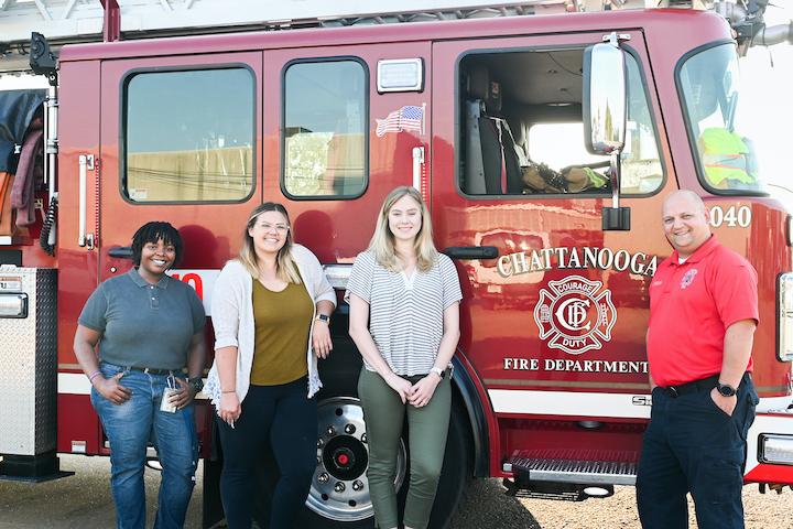 Group in front of fire truck