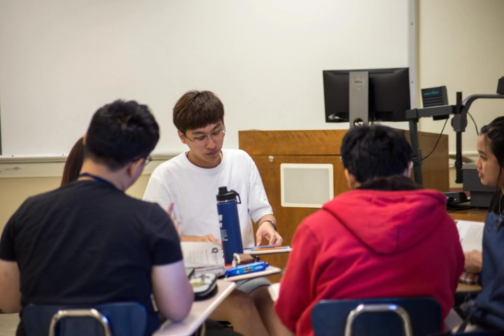 ESL students working