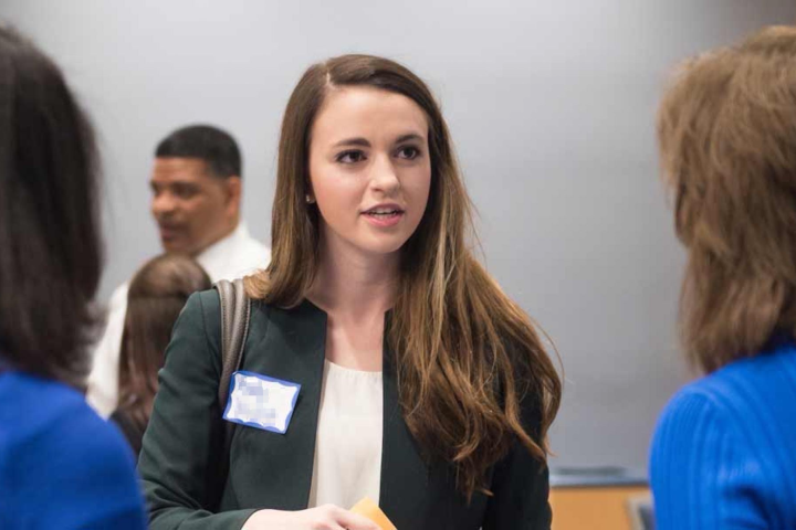 Woman speaking with prospective employers