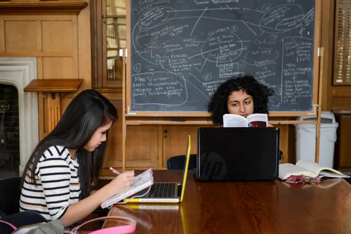 students at a table studying