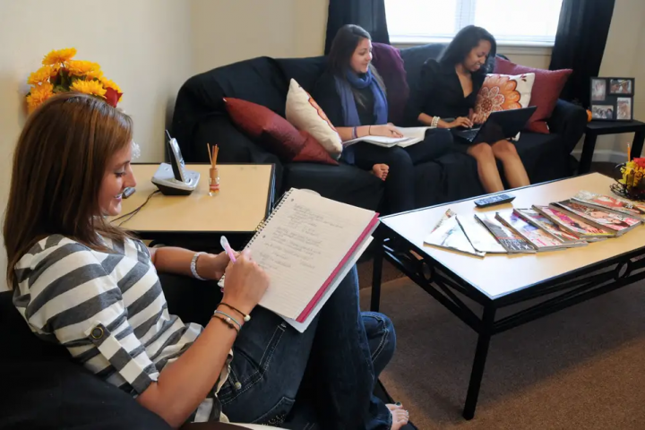 Students working in the dorm