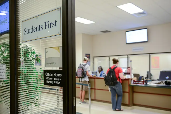 students in line in office