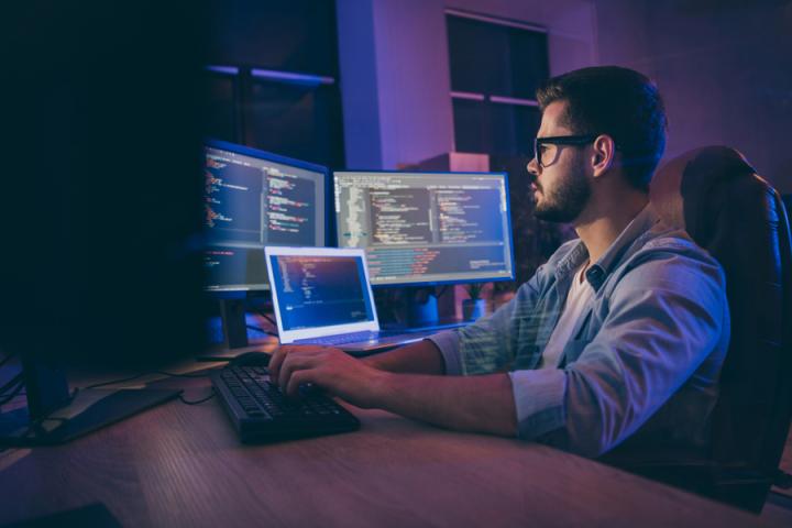 IT Male Working on Digital Project Stock Photo IT Male Working on Digital Project Stock Photo