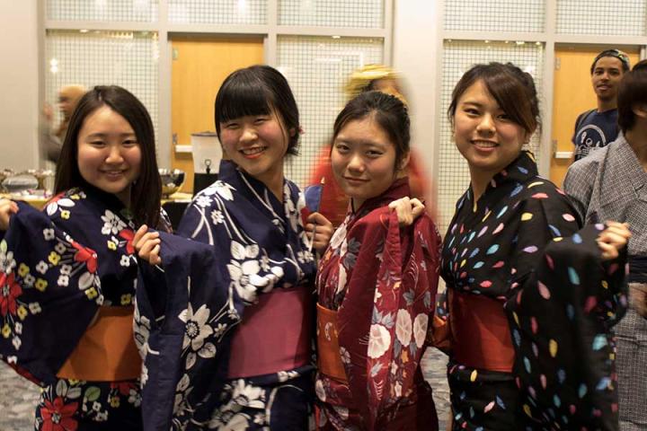 JFOU students wear traditional Japanese clothing for a banquet.  