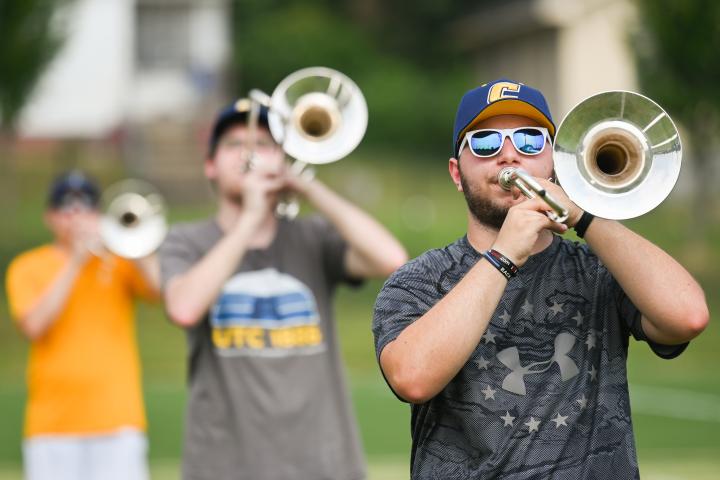UTC band students with trombones