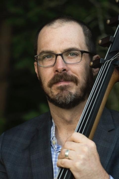 Taylor Brown holding a string bass