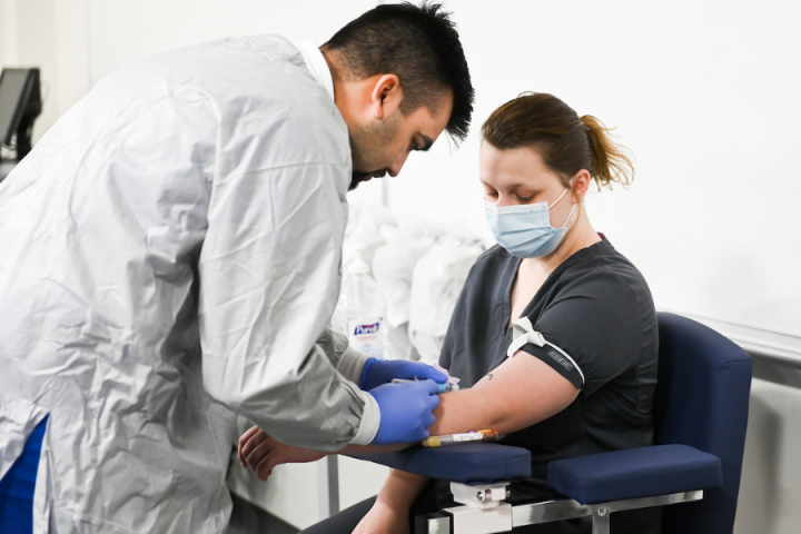 male drawing a female's blood