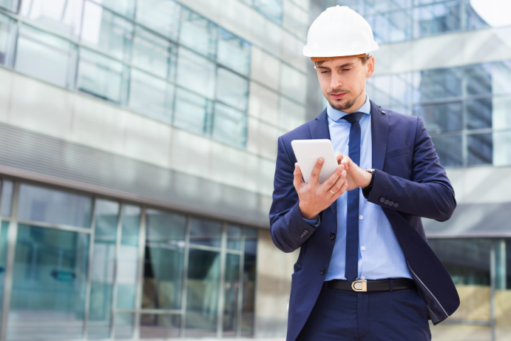 male logistic worker on ipad