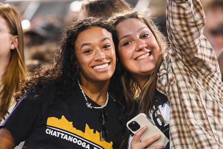 Females cheering at a game