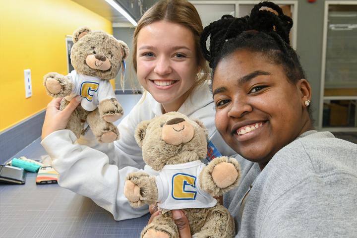 Females with teddy bears Females with teddy bears