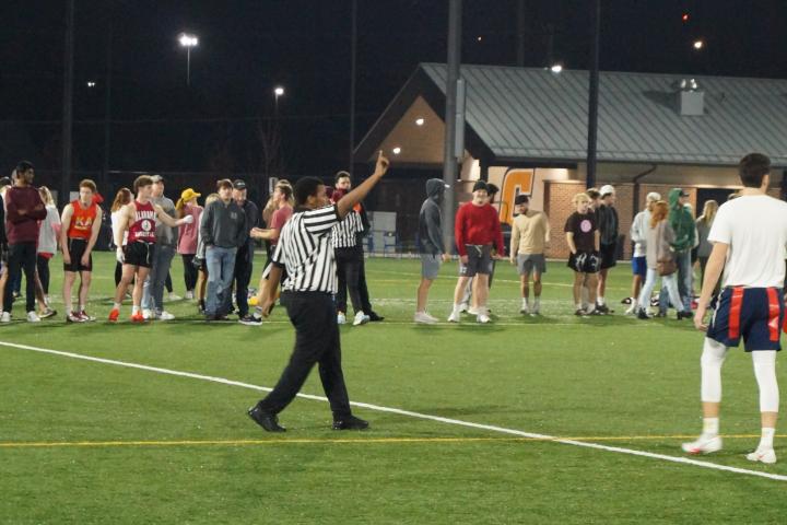 A Flag Football official announces the upcoming down.