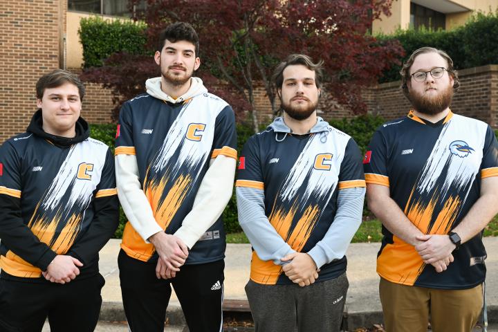 The four UTC Call of Duty players pose in their jerseys.