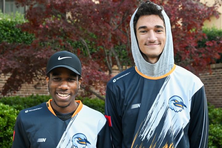 Fall 2022 Rocket League B team Two of the UTC Rocket League B team players pose in their jerseys.