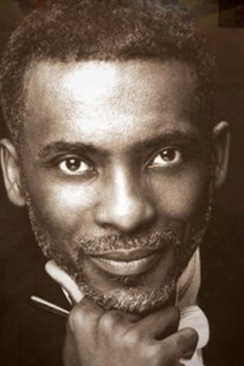 Andre Thomas BW Black and white headshot of Andre Thomas