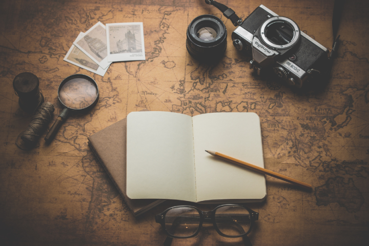 world map and camera
