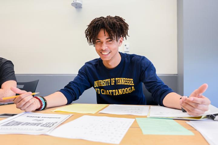 Male Student at a desk