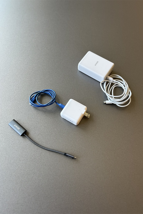 Equipment Checkout - Cords and Cables Photograph of a variety of charging cables and adaptors