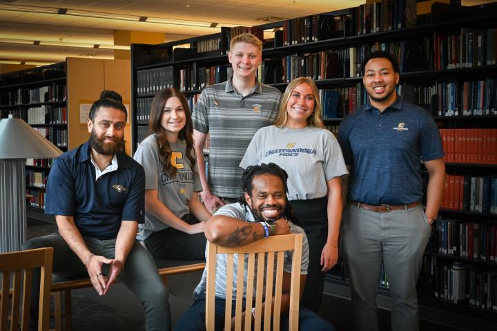 Admissions Counselors Group of admissions counselors in the library