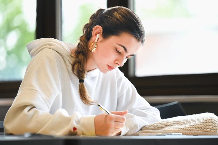 Student studying in a classroom