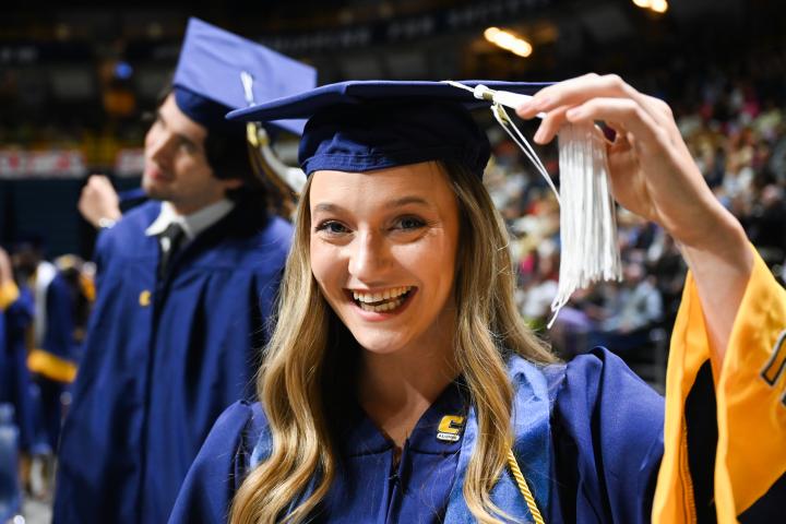 Students in caps and gowns at graduation