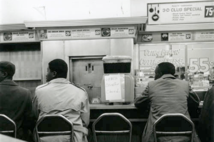 Photograph of a lunch counter sit-in eye-level view, 1960 February