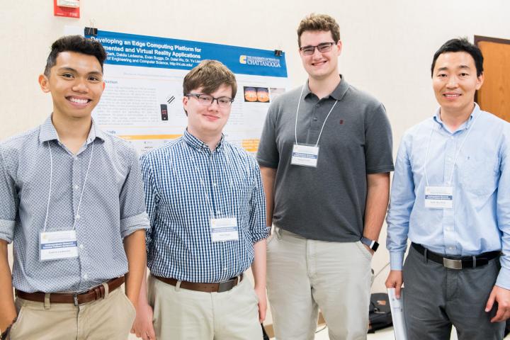 Students presenting at symposium