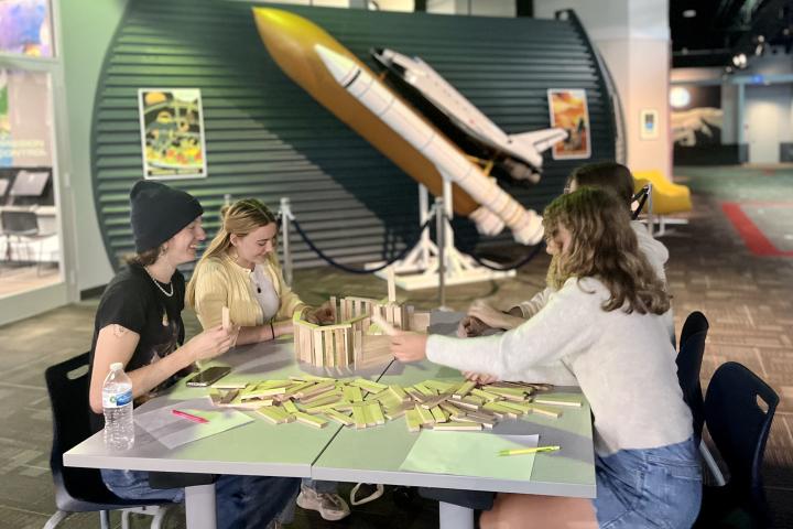 Students collaborate on an activity at the Challenger Center