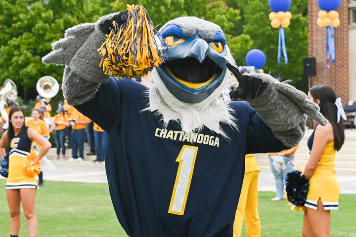 Photograph of Scrappy the mascot at a homecoming event