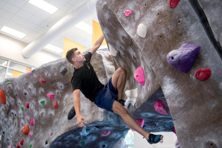UTC student climbing at the ARC