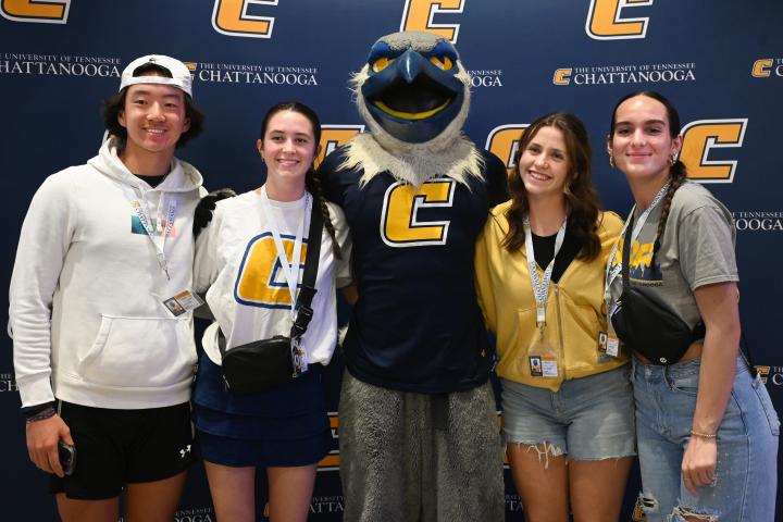UTC Power C Tour UTC prospective students standing with scrappy