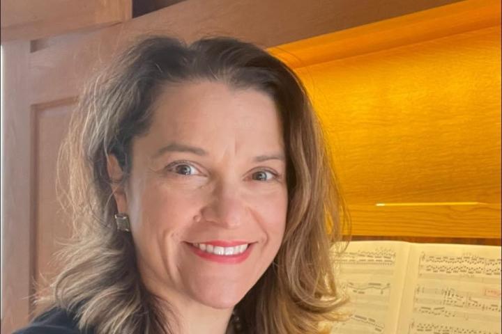 Headshot of Adrienne Cox at Organ