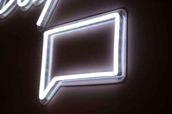 Illuminated neon speech bubble