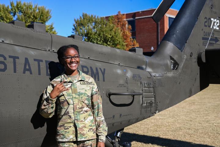 UTC Military Students UTC Military students standing in front of a Black Hawk helicopter