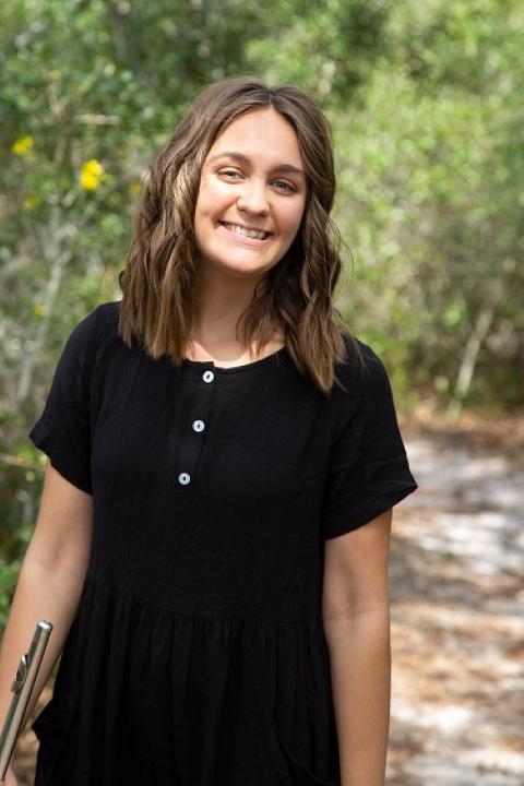 Headshot of Brenna Wiinanen with flute