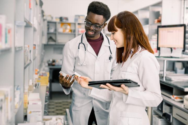 man and woman in pharmacy