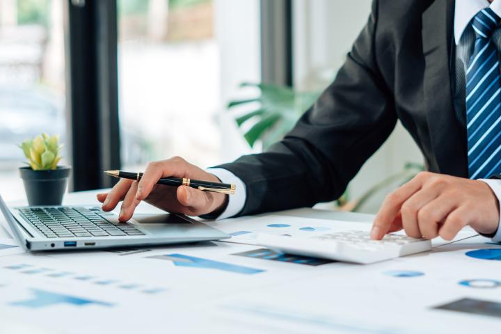 Professional working on accounting work Professional working on accounting work